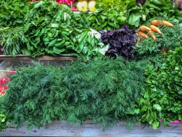 Fresh vegetables and herbs at Danilovsky Market in Moscow