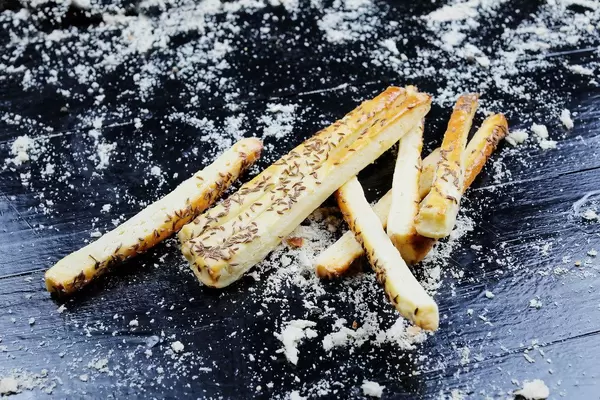 Freshly baked cheese crackers with caraway seeds (Flip 2019)