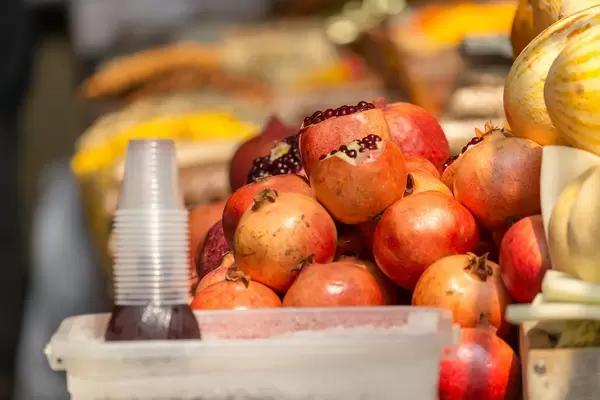 Freshly squeezed pomegranate juice at Danilovsky Market in Moscow