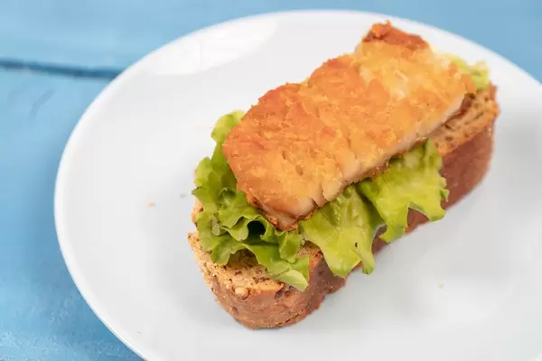 Fried-Alaska-Pollock-fish-sandwich-with-fresh-lettuce.jpg