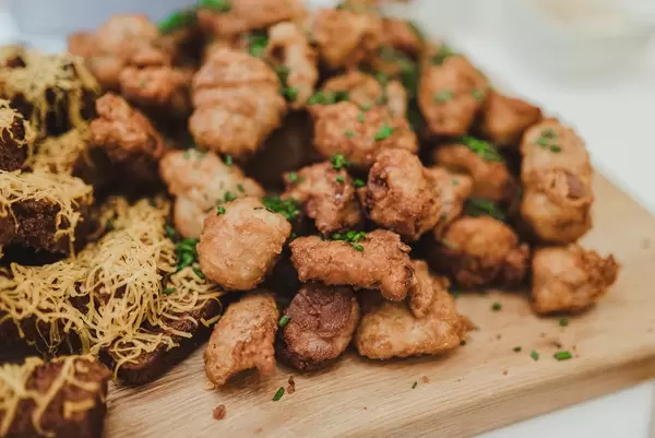 Fried Chicken Close Up On Wooden Surface (Flip 2019)