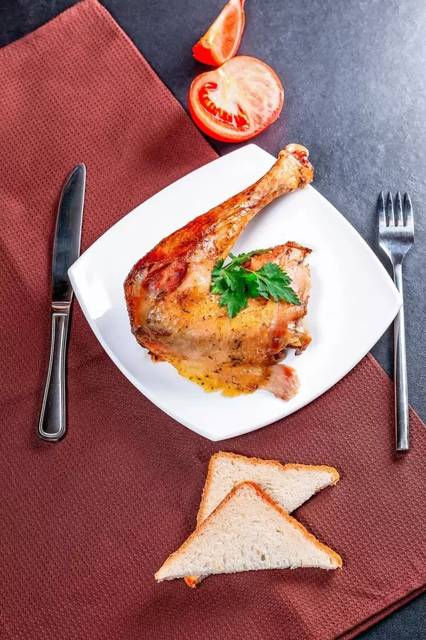 Fried chicken leg with Cutlery and brown dish towel (Flip 2019)