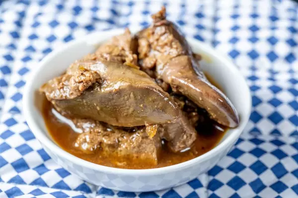 Fried chicken liver in a white bowl