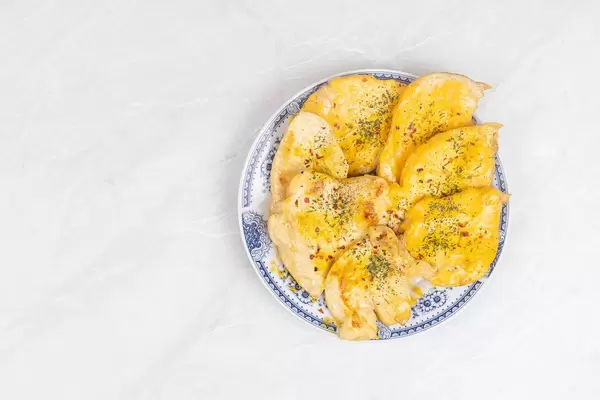 Fried Chicken meat with Cheese on the plate with copy space