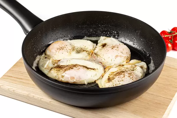 Fried eggs in a frying pan