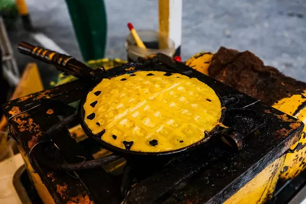 Fried pancake on old stove and pan (Flip 2019)