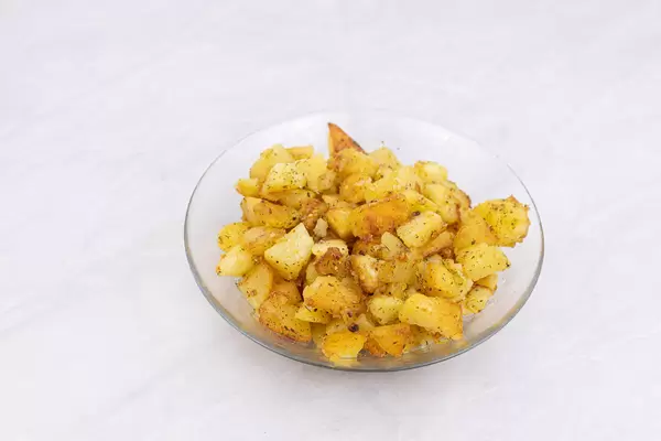 Fried Potatoes served in the glass bowl
