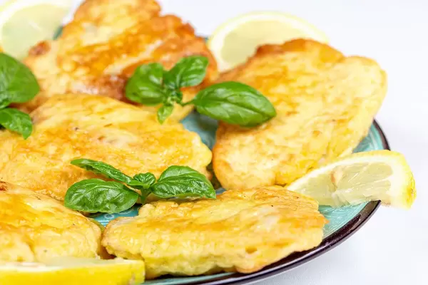 Fried tilapia fillet in batter, close-up