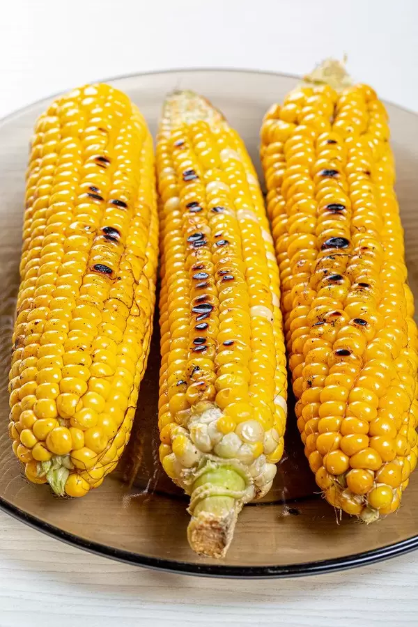 Fried young corn on plate