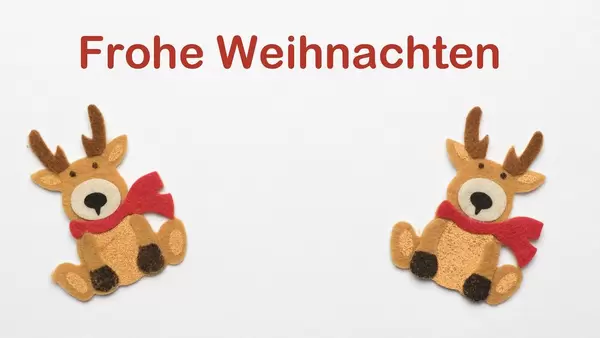 Frohe Weihnachten Schriftzug mit Rentieren