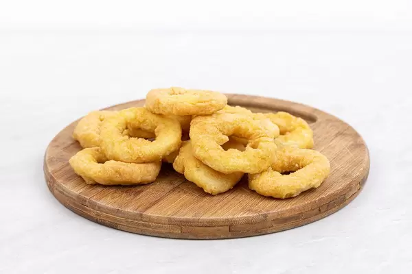 Frozen Fish Rings on the wooden board