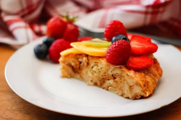 Fruits Tart with Strawberries, Raspberries, Blueberries and Mango on Top