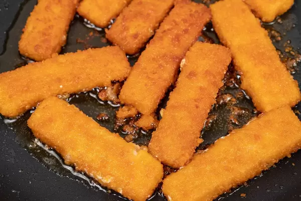 Frying Fish Sticks in the hot oil (Flip 2020)