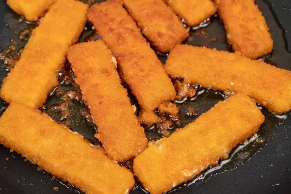 Frying Fish Sticks in the hot oil
