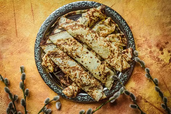 Frying Pancakes With Chocolate Filling On Orange Background (Flip 2020)