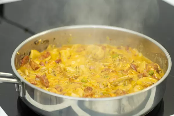 Frying Sausages with Mushrooms Tomatoes