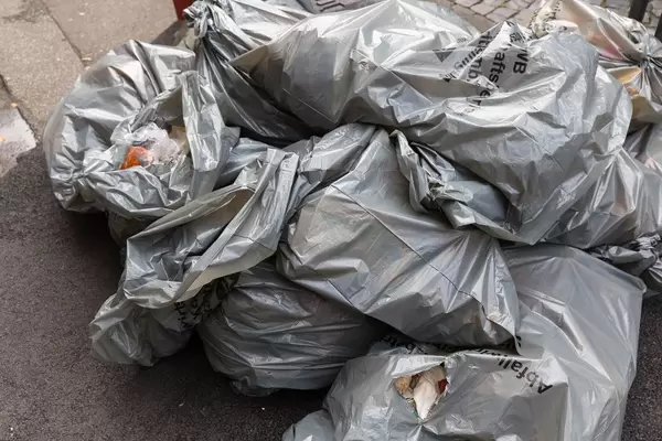 Full garbage bags of the AWB Köln