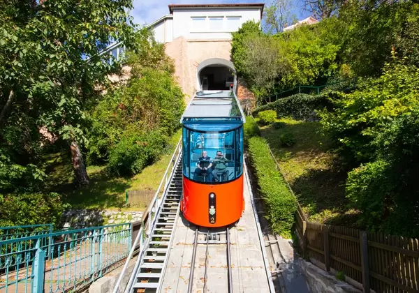 Funicular climbing to Schlossberg and Graz city panoramic view