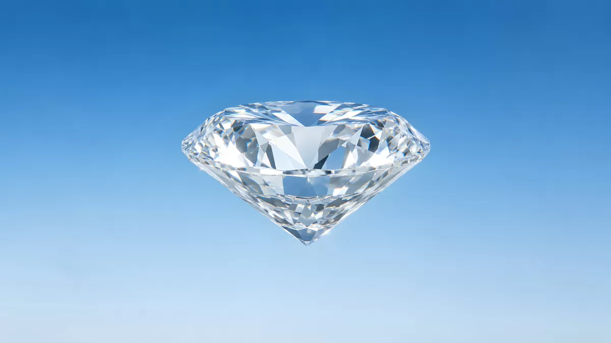 Funkelnder Brillant schwebt vor blauem Hintergrund