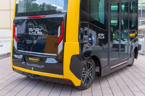 Futuristic mobility: self-driving electric shuttle  driverless vehicle EasyMile