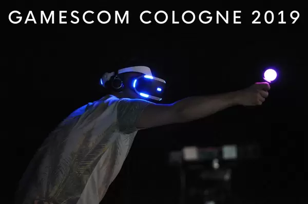 Gamescom Cologne 2019 picture shows man with vr-glasses and light cone in his hand at the the world's largest fair for video games
