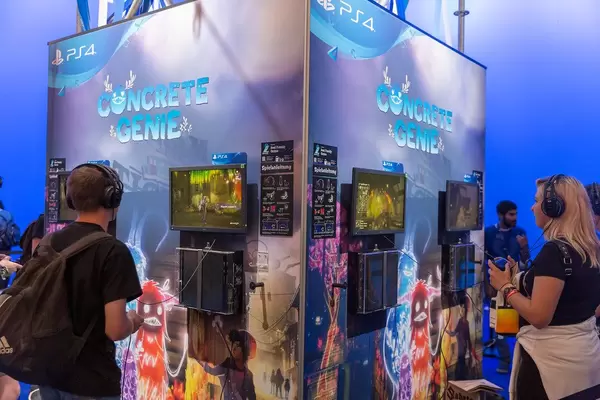 Gamescom visitors at PS4 Gaming Stations playing Concrete Genie