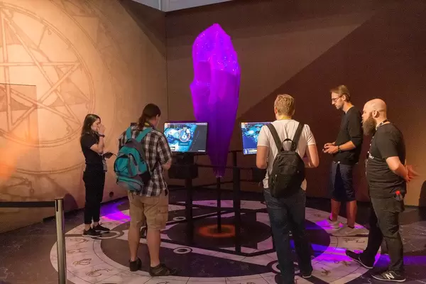 Gamescom visitors testing the adventure computer game of tv show  The Dark Crystal: Age of Resistance