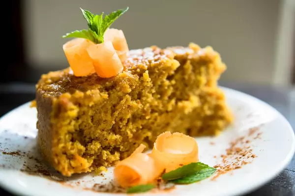 Garnished slice of carrot cake
