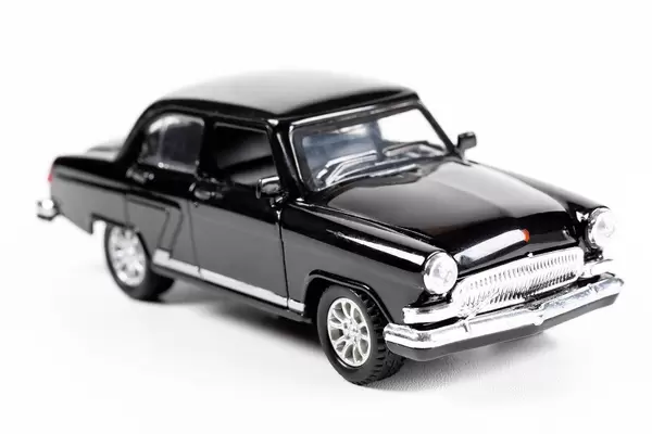 GAZ 21 metal car model on a white background