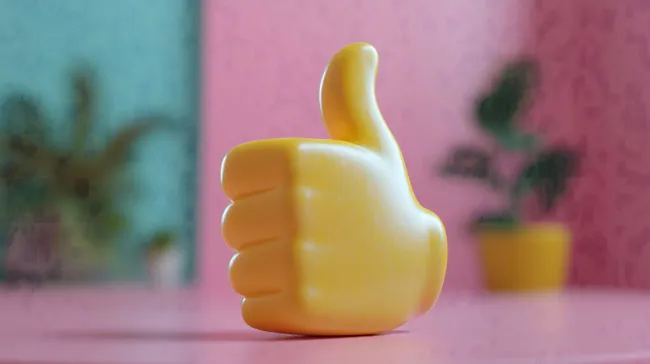 Gelber Daumen-Emoji mit positiver Geste