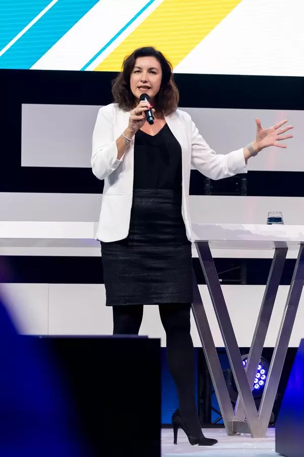 German politician Dorothee Bär gesticulates as she talks about the government's efforts for innovation during the Digital X convention in Cologne