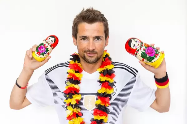 German soccer fan with Russian babushka dolls