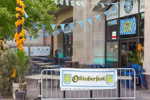 German traditions in the US: Oktoberfest celebrated with Bavarian flags, food and beer in Chicago