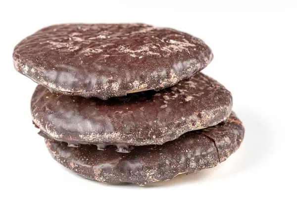 Gingerbread cookies in chocolate glaze on a white background (Flip 2020)