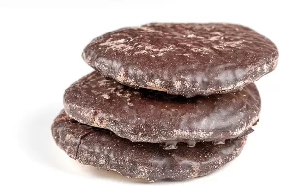 Gingerbread cookies in chocolate glaze on a white background