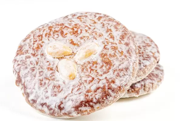 Gingerbread cookies with peanuts on a white background (Flip 2020)