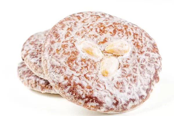 Gingerbread cookies with peanuts on a white background