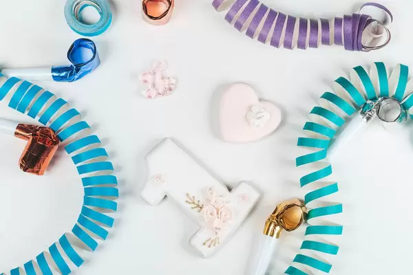 Gingerbread one and heart on white background with holiday accessories
