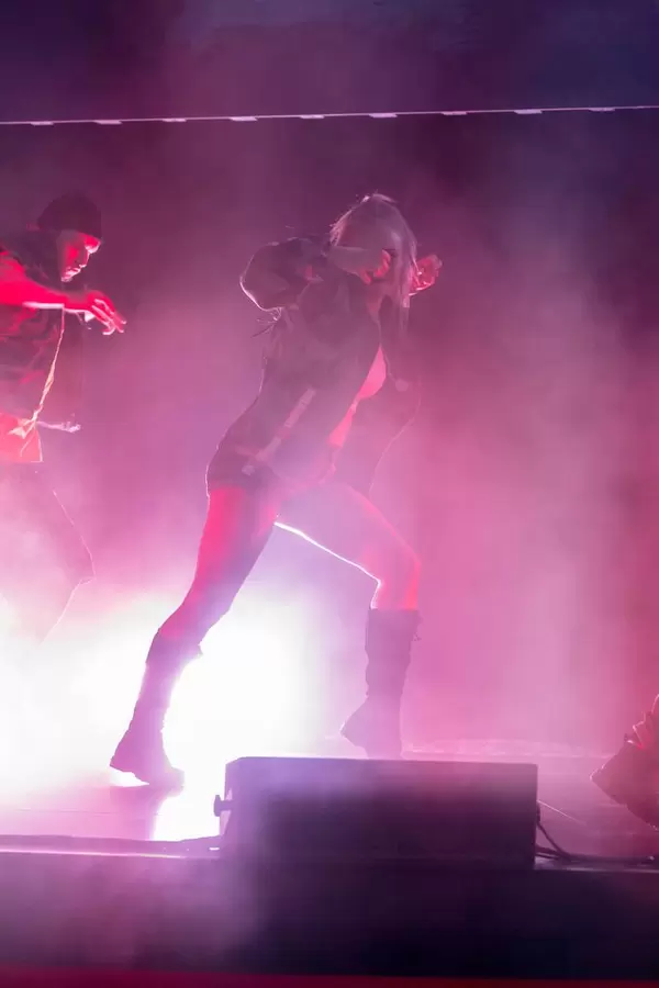 Girl dancing on World of Thanks stage at Gamescom