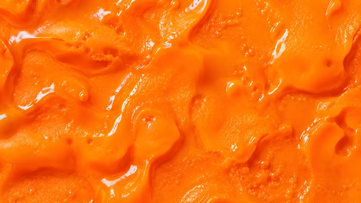 Glänzende orangefarbene Farbe als abstrakte Textur