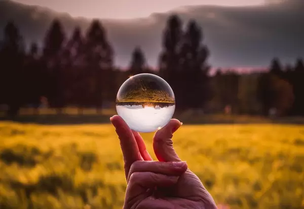 Glass ball in girls hand