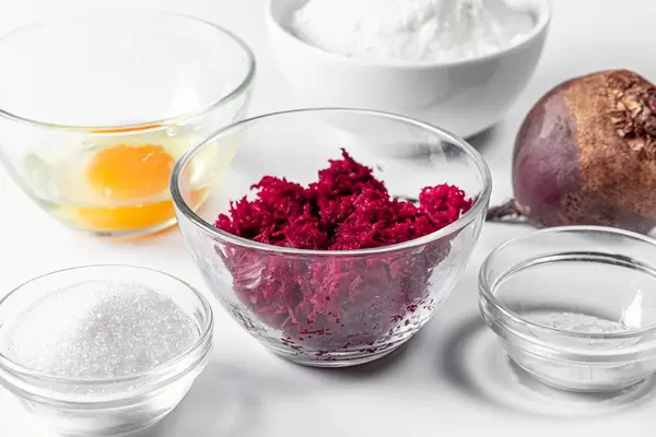 Glass bowls with ingredients for beetroot pancakes (Flip 2019)