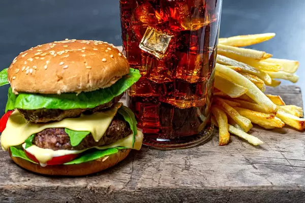 Glass of Cola with ice, French fries and Burger close-up (Flip 2019)