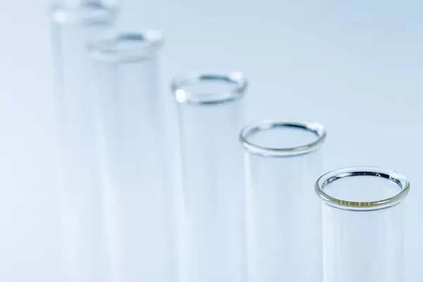 Glass test tubes close-up. The concept of research (Flip 2020)