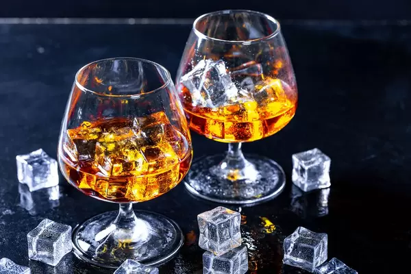 Glass with cognac closeup
