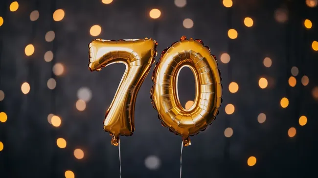 Glitzerndes 70. Geburtstagsjubiläum mit goldenen Ballons