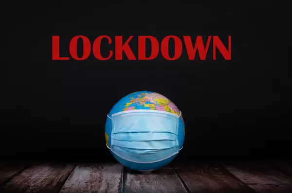 Globe with face mask and Lockdown text