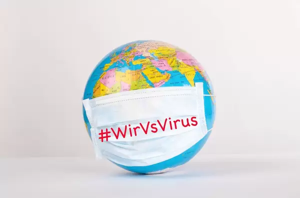Globe with medical mask on white background with #WirVsVirus text.jpg