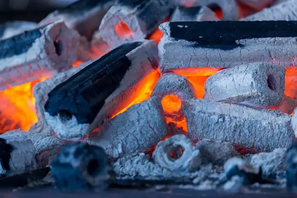Glowing charcoal on a huge grill at Gamescom