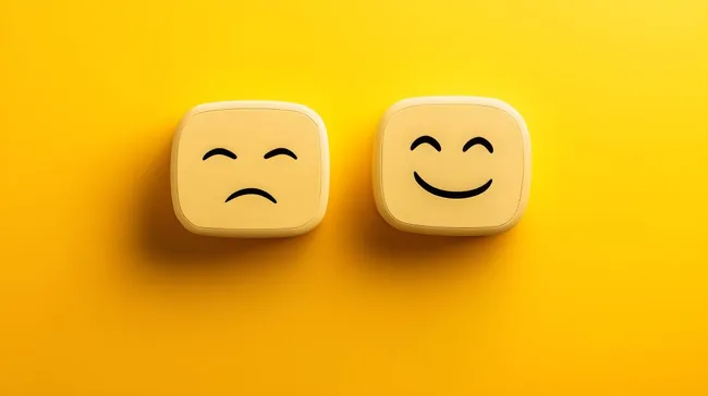 Glückliche und traurige Emoticons auf gelbem Hintergrund